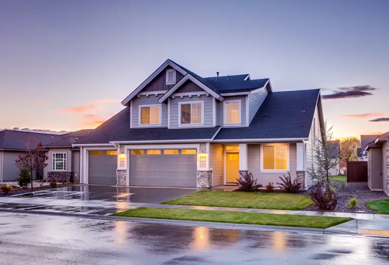 A home at dusk, shown for illustration
